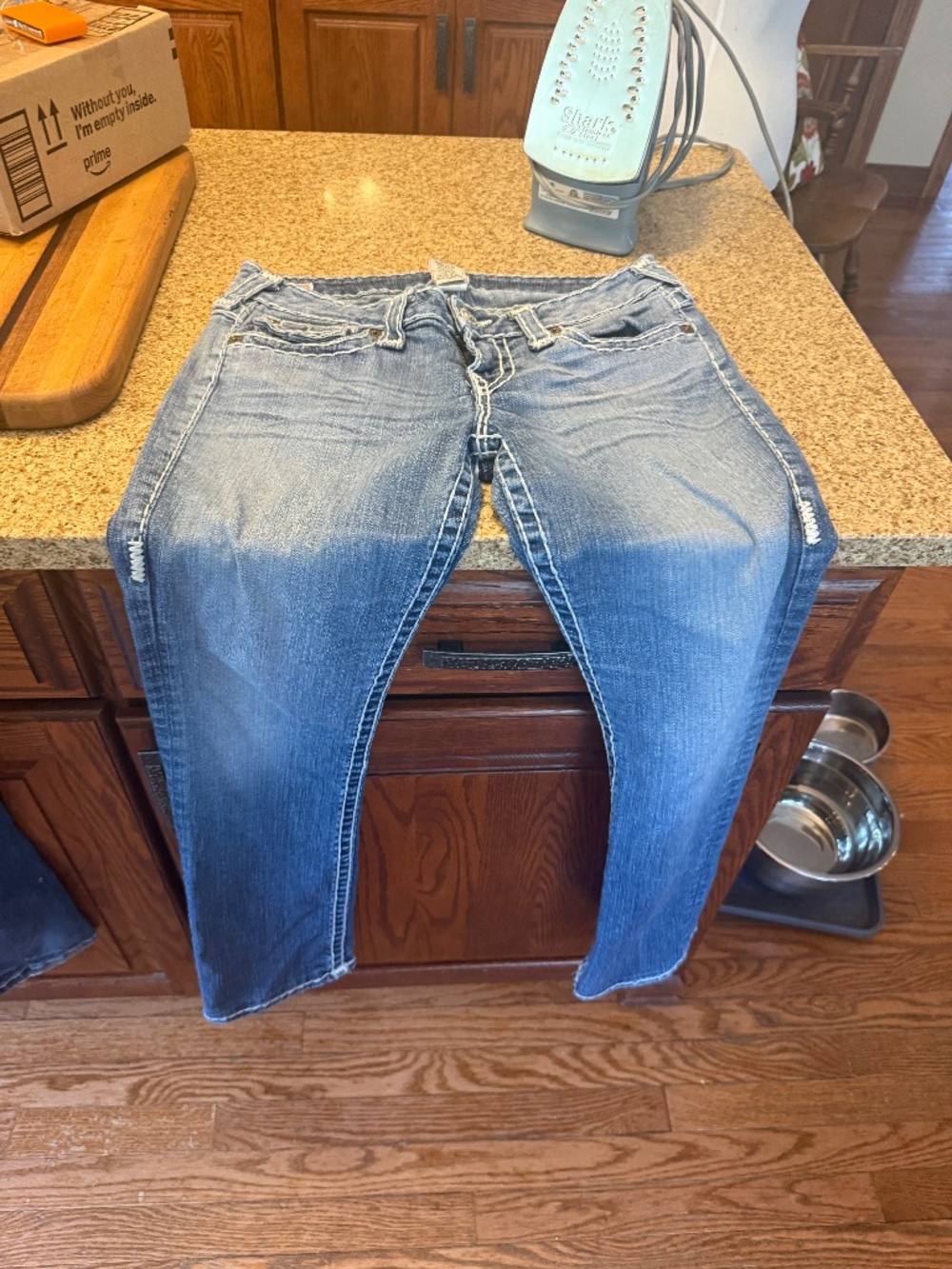 2 pair jeans- 1 True religion, 1miss Me